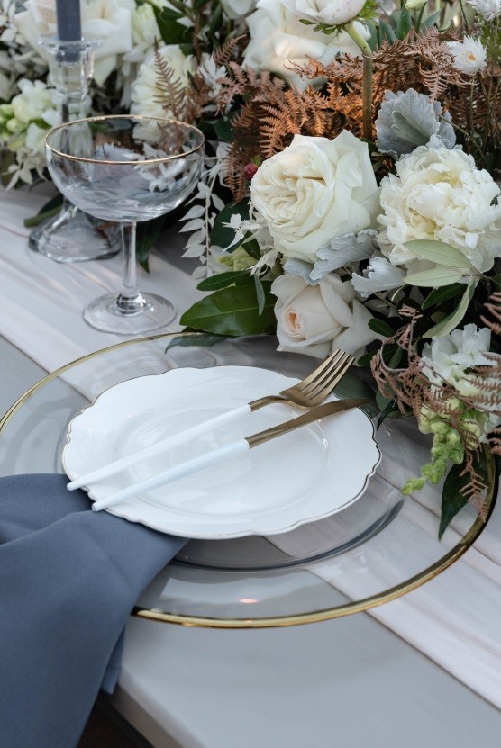 Beautifully decorated places setting on a table