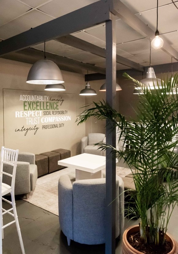 IWH academy's neat and tidy reception, that is beautifully decorated.